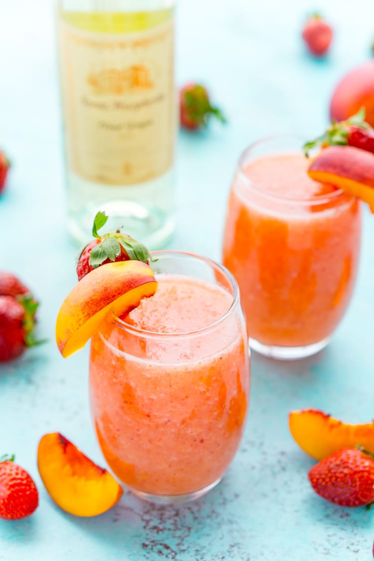 Two glasses of strawberry peach wine slushie