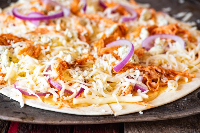 Prepared buffalo chicken pizza ready for oven