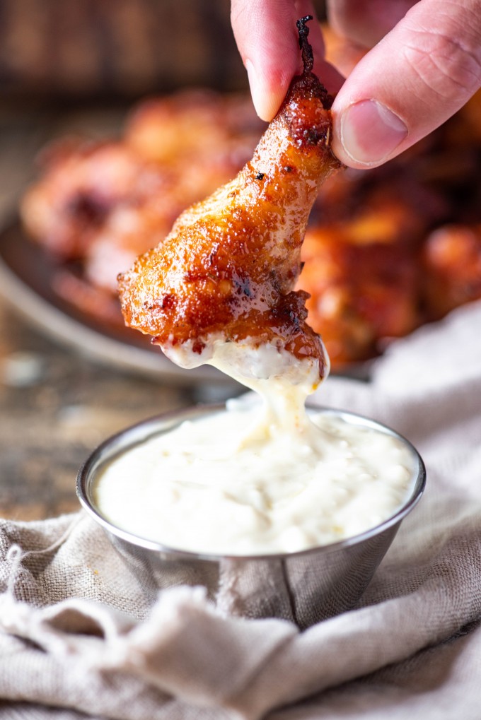Smoked Chicken Wing Dunked in Blue Cheese