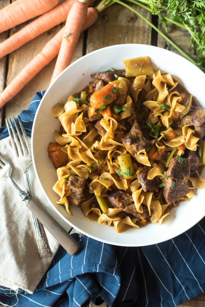 Instant pot beef stew pasta in a white bowl