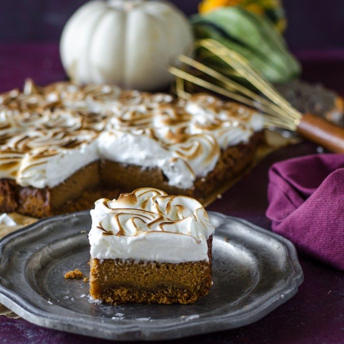 Apple butter pumpkin pie bars on a silver plate