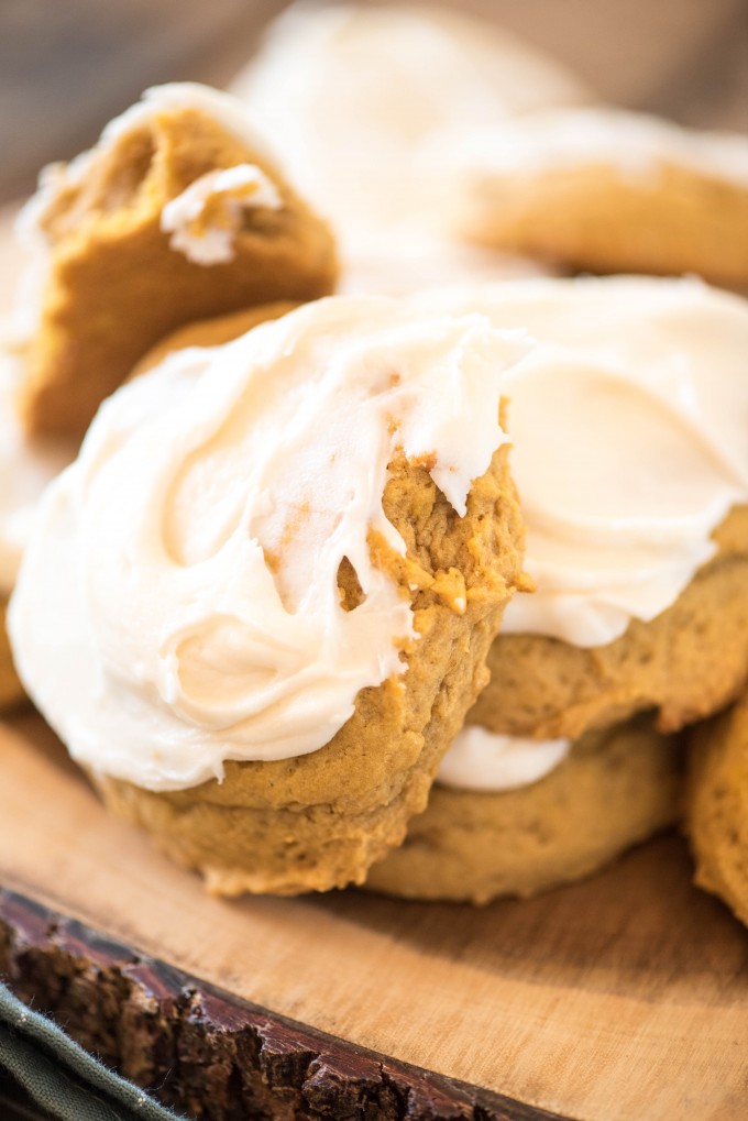 Pile of iced pumpkin spice cookies 