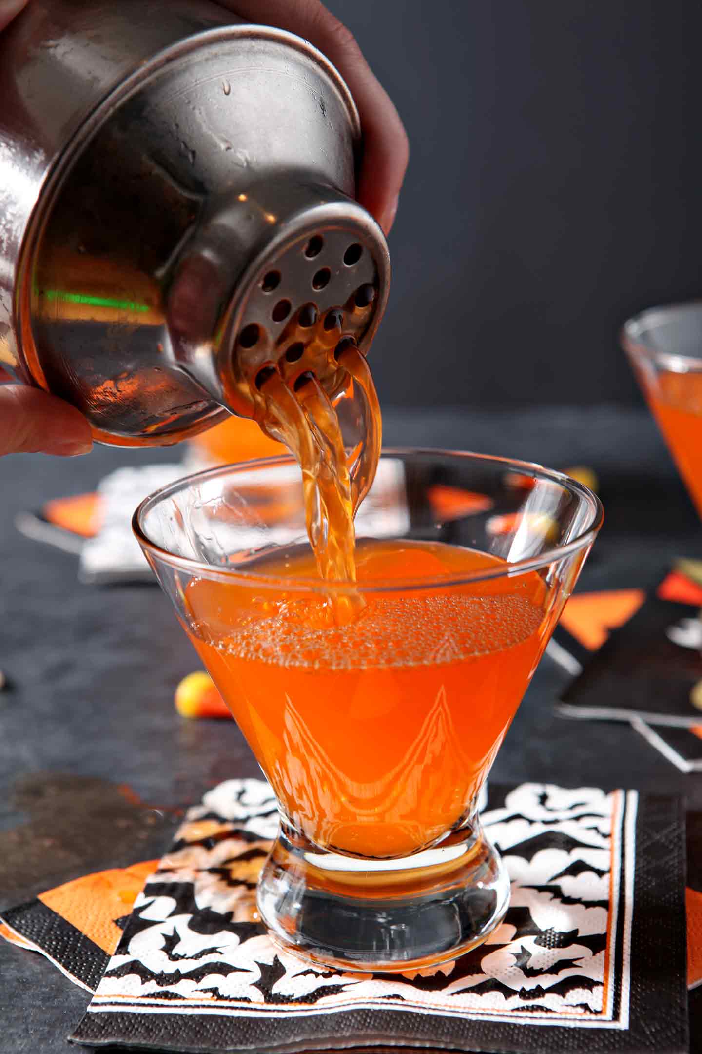 Candy corn martini poured into a glass