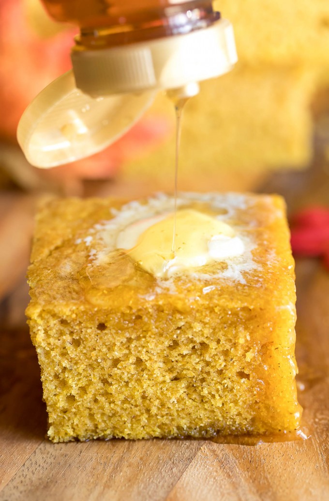 Stack of pumpkin cornbread with honey