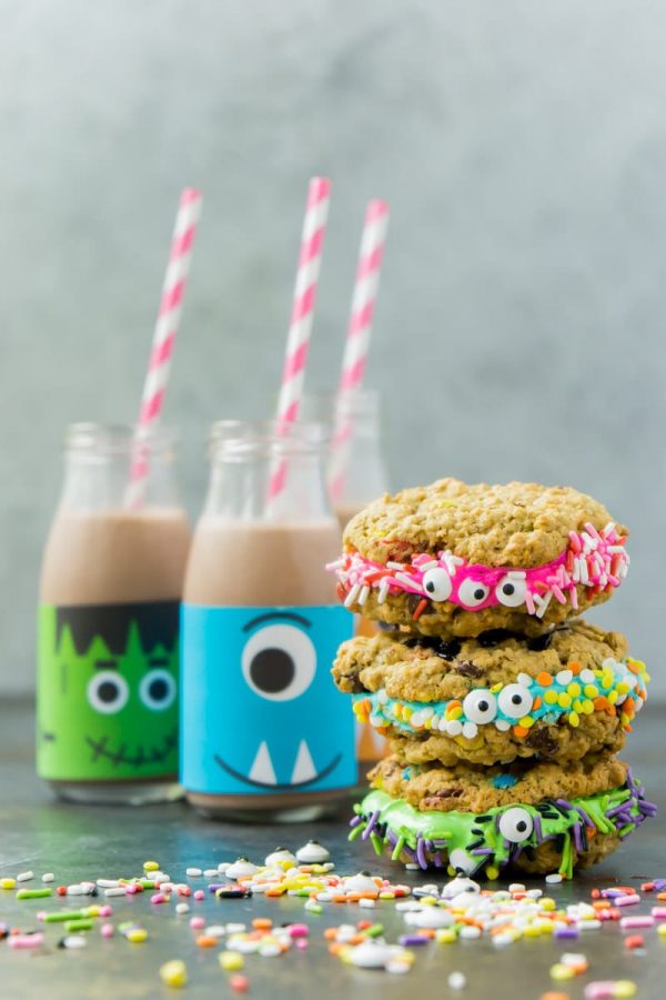 Stack of monster cookies with chocolate milk in the background