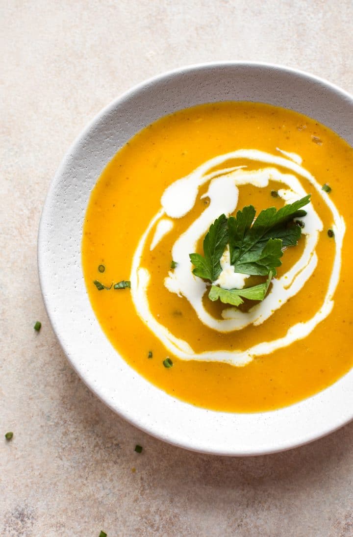 Pumpkin soup in a white bowl