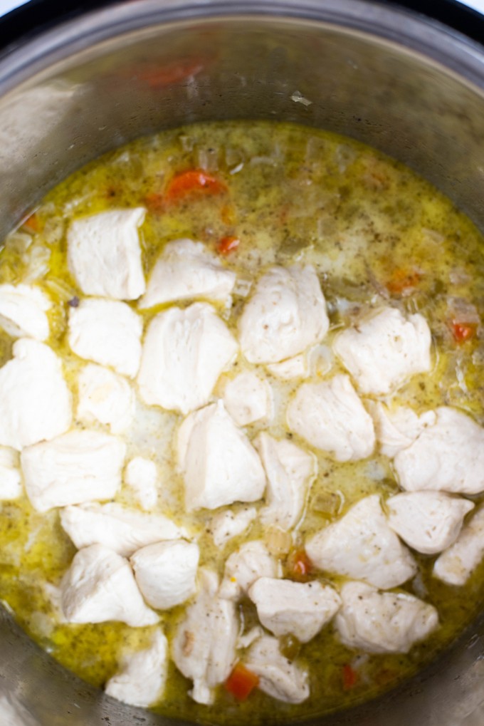 Biscuits simmering in broth 