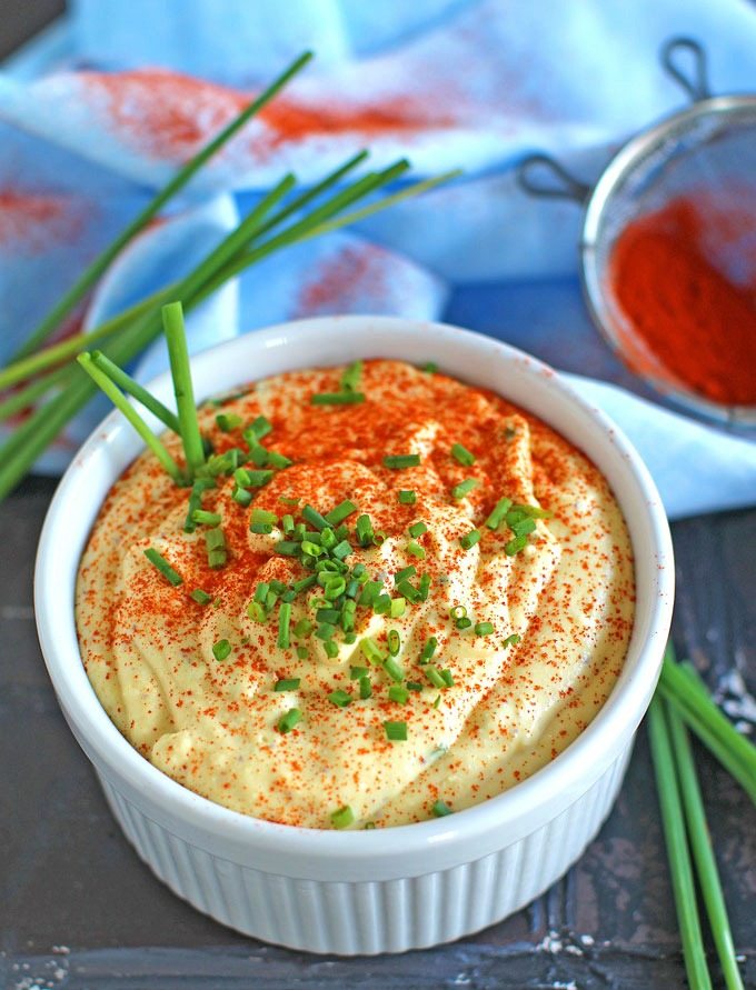 deviled egg dip topped with scallions