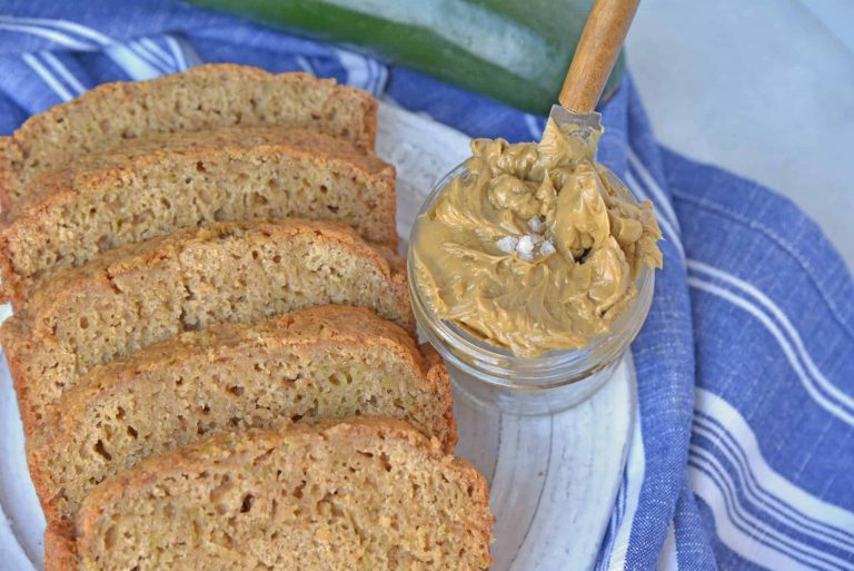 Zucchini bread sliced with butter spread