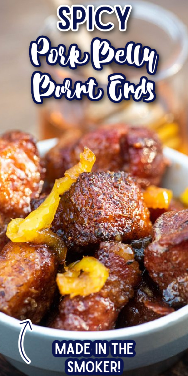 Forget the oven and break open your Traeger for this delicious, spicy Pork Belly Burnt Ends recipe! Made with banana peppers and brown sugar, these burnt ends are perfectly sweet and spicy, with that just smoked flavor! #gogogogourmet #porkbellyburntends #burntends #traeger via @gogogogourmet