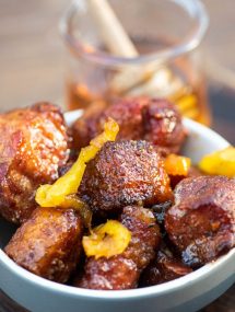 Pork belly burnt ends in a white bowl