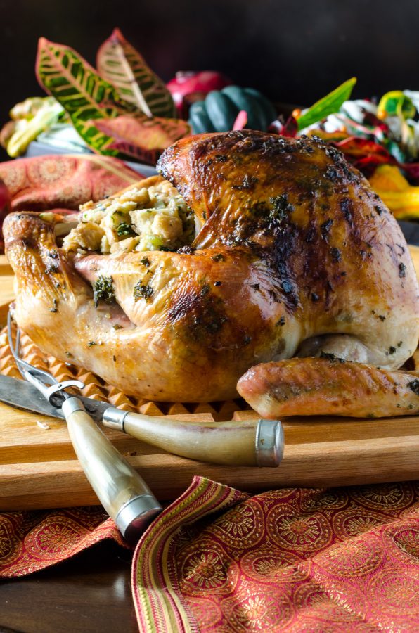 Close up of Herb Roasted Turkey on a cutting board