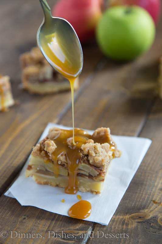 Caramel drizzled onto caramel apple pie bars