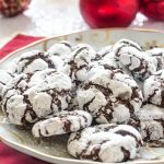 Chocolate crinkle cookies on a white plate