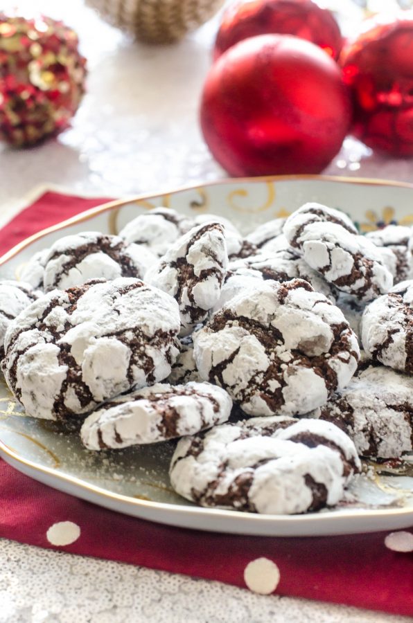 Chocolate crinkle cookies on a white plate