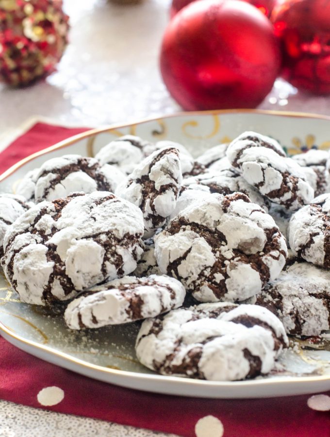 Chocolate crinkle cookies on a white plate