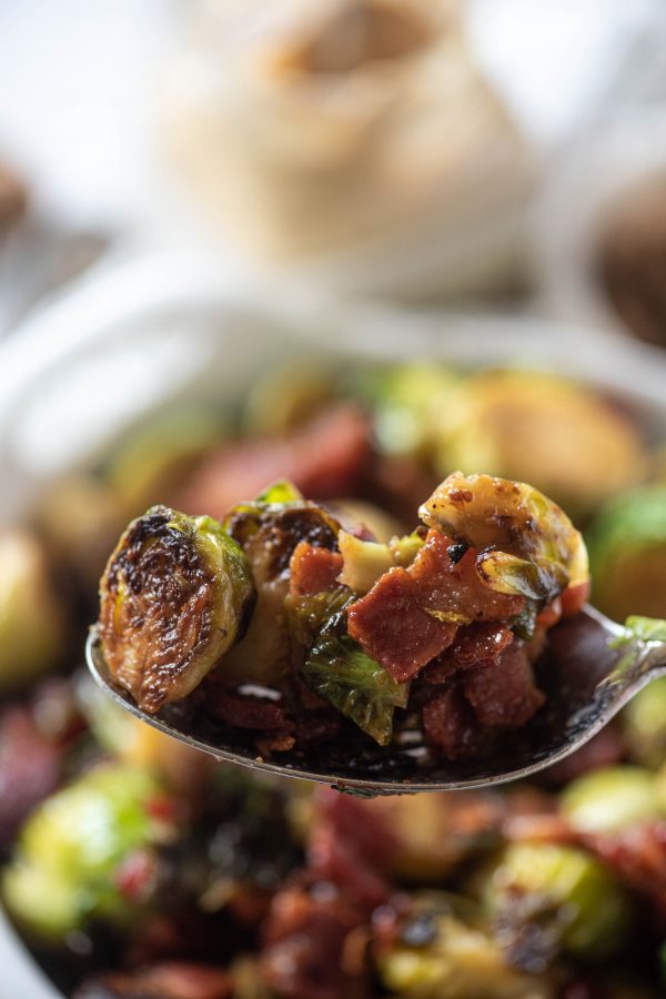 Close up of stovetop brussels sprouts on a spoon